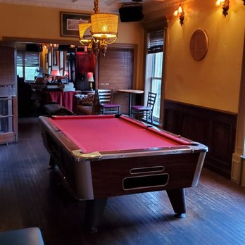 Gator Club - a pool table in the middle of the room - Bars Near Me - Sarasota, Florida