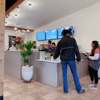 Sharetea - a group of people in a restaurant - Bubble Tea Near Me - St. Charles, Illinois