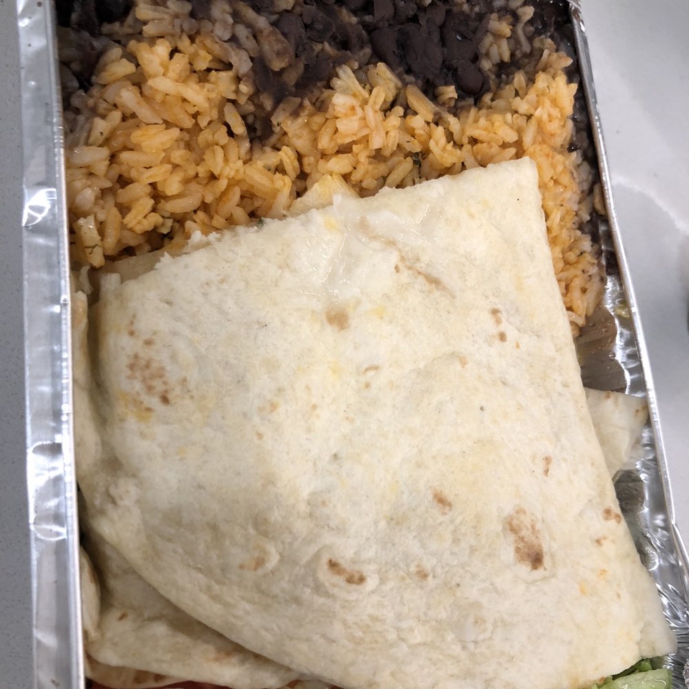 Puebla - a burrito, rice, and beans in a foil container - Mexican Near Me - New York, New York