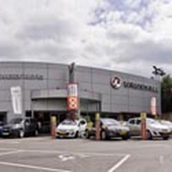 County Motor Works Chelmsford - Vauxhall and Chevrolet showrooms, with Alfa Romeo Showroom to the left.