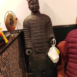 The doorman held our left over bag while we put our coats on.