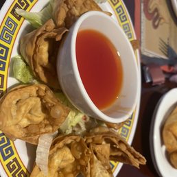 a plate of food and a cup of tea