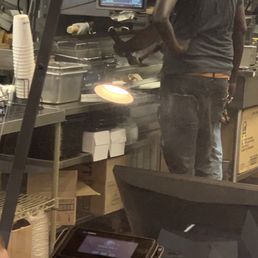 a man cooking in a restaurant kitchen a man cooking in a restaurant kitchen