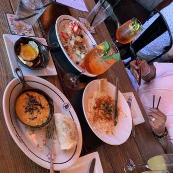 Bosscat Kitchen & Libations - Brunch mimosas, best shrimped and grits ever and fruity pebbles French toast - New American Near Me - Irvine, California Bosscat Kitchen & Libations - Brunch mimosas, best shrimped and grits ever and fruity pebbles French toast - New American Near Me - Irvine, California
