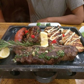 Martin Fierro Restaurant - Meat lovers parrillada. Best $45 well spent lol chorizo, rib eye, chicken breast, skirt steak, and a NY steak. With two sides. - Steakhouses Near Me - Naples, Florida Martin Fierro Restaurant - Meat lovers parrillada. Best $45 well spent lol chorizo, rib eye, chicken breast, skirt steak, and a NY steak. With two sides. - Steakhouses Near Me - Naples, Florida