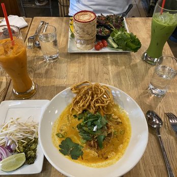 Super Thai Cuisine - Upper half: green thai iced tea, trigger cry Lower half: kao soi, Thai iced tea - Thai Near Me - Austin, Texas Super Thai Cuisine - Upper half: green thai iced tea, trigger cry Lower half: kao soi, Thai iced tea - Thai Near Me - Austin, Texas