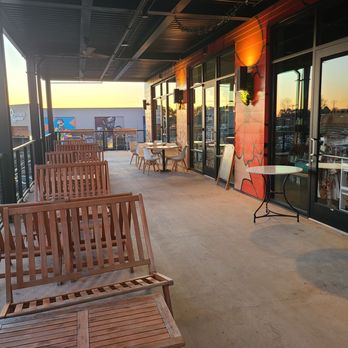 Aperitif - Covered outdoor seating (there are cushions for the benches bit they were inside - I visited on a chilly day) - Desserts Near Me - Durham, North Carolina