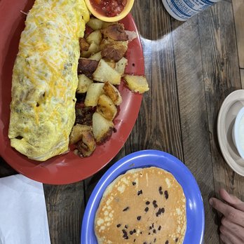 Downtown Diner - Spaniard omelette (sub chorizo for sausage) and chocolate chip pancake - Breakfast & Brunch Near Me - Titusville, Florida Downtown Diner - Spaniard omelette (sub chorizo for sausage) and chocolate chip pancake - Breakfast & Brunch Near Me - Titusville, Florida