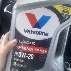 Walmart Supercenter - Motor oil that was left in my car. Getting all over my seat & children's belongings.