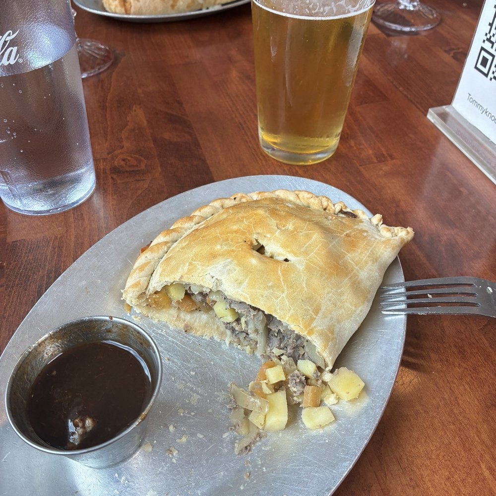 Tommyknocker's Cornish Pasty - Teddy Oggie Pasty (Traditional Steak) and Chet's gold beer - British Near Me - Port Townsend, Washington Tommyknocker's Cornish Pasty - Teddy Oggie Pasty (Traditional Steak) and Chet's gold beer - British Near Me - Port Townsend, Washington