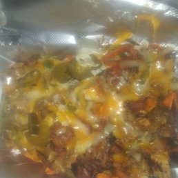 Jerk chicken nachos...good but need some acid to cut some fat. I prefer nacho cheese
