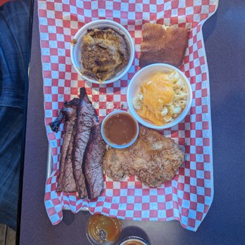 BIG NICK'S - My dinner that included a breaded pork chop, brisket, candied yams, mac & cheese, and cornbread.  Everything was amazing! - Chicken Wings Near Me - Valdosta, Georgia
