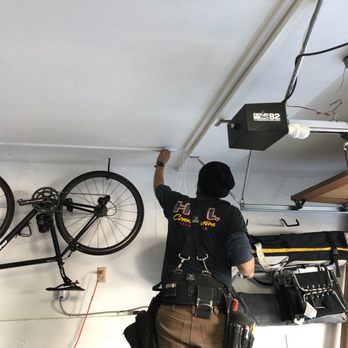 Infinite Tech Services - Freddy adding raceway for a clean install of ethernet cables for a camera in the garage - Security Systems Near Me Infinite Tech Services - Freddy adding raceway for a clean install of ethernet cables for a camera in the garage - Security Systems Near Me