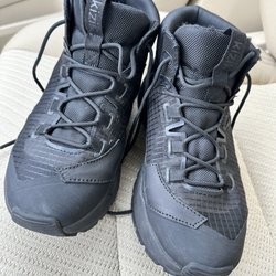 New Life Shoe Repair - After getting fixed. He sewed black leather over the tears in a way that made it look purposeful and rather stylish.