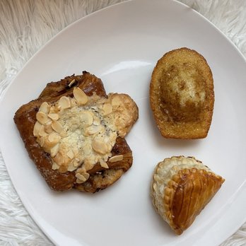L'Ami Pierre - French Cafe - Chocolate & almond croissant, crème brûlée madeleine, apple turnover - French Near Me - New York, New York L'Ami Pierre - French Cafe - Chocolate & almond croissant, crème brûlée madeleine, apple turnover - French Near Me - New York, New York