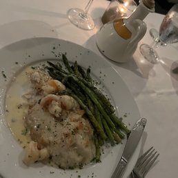 Grouper with white sauce and shrimp. Delicious. Grouper with white sauce and shrimp. Delicious.