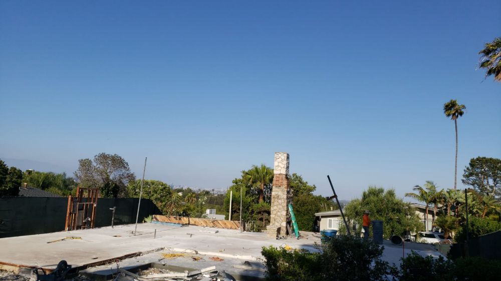 Slide of Alex's Hauling & Demo