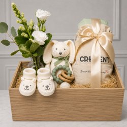 Wine & Blooms - Welcome a precious little one with this thoughtfully curated gift collection. It includes a 100% organic cotton blanket...