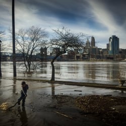 Licking Riverside Historic District - A boy playing on the south side of the Ohio river during the flood.on the Covington, KY river bank.