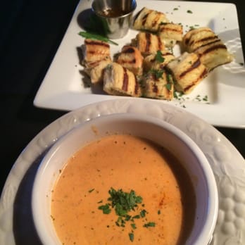 Over The Moon Cafe - Crab bisque with little grilled cheese appetizer thingy. - New American Near Me - Tacoma, Washington Over The Moon Cafe - Crab bisque with little grilled cheese appetizer thingy. - New American Near Me - Tacoma, Washington