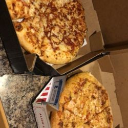 Domino's Pizza - The one on the left was a pan pizza with extra sauce and chicken. And the one on the right is an Alfredo hand tossed pizza.