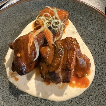 Joe Theismann's Restaurant - CRISPY BUFFALO PORK BELLY BITES - American Near Me - Alexandria, Virginia Joe Theismann's Restaurant - CRISPY BUFFALO PORK BELLY BITES - American Near Me - Alexandria, Virginia