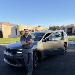 David with his SUV before a client pickup.