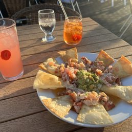 Lobsters Nachos, spiked Strawbery lemonade, aperol spritz Lobsters Nachos, spiked Strawbery lemonade, aperol spritz