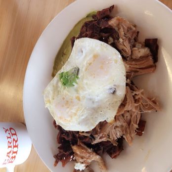 Early Bird - Carnitas Chilaquiles. Bomb! This plate can feed up 2 ppl. - New American Near Me - Fullerton, California