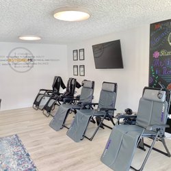 OsteoStrong Studio City - PEMF mats and Normatec compression systems