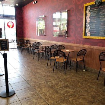 Cold Stone Creamery - tables and chairs in a restaurant - Ice Cream & Frozen Yogurt Near Me - Fayetteville, Arkansas Cold Stone Creamery - tables and chairs in a restaurant - Ice Cream & Frozen Yogurt Near Me - Fayetteville, Arkansas