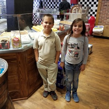 Savannah Candy Kitchen - Bill Lewis of Fort Lauderdale, Florida, hanging out with his kids at Savannah Candy Kitchen in National Harbor, Maryland. - Candy Stores Near Me - Fort Washington, Maryland