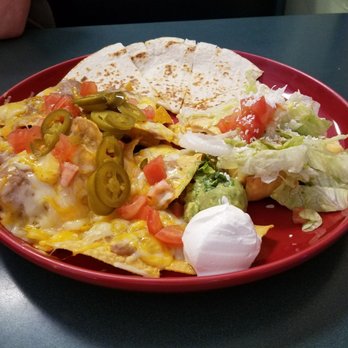 Francisco's Mexican Restaurant - I believe this is the tostada and quesidilla combo. Typical Tex-Mex yet still very good. - Mexican Near Me - Melbourne, Florida Francisco's Mexican Restaurant - I believe this is the tostada and quesidilla combo. Typical Tex-Mex yet still very good. - Mexican Near Me - Melbourne, Florida