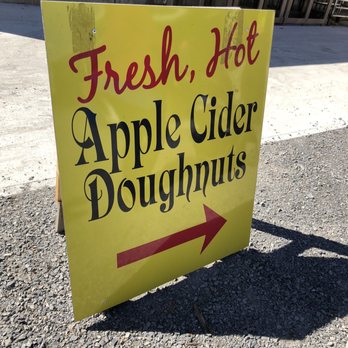 Mountain Orchards - a sign for fresh hot apple cider doughnuts - Fruits & Veggies Near Me - Mountain, Ontario