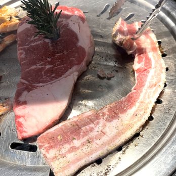 Seoul Meat Co - Ribeye and Pork Belly on the grill - Korean Near Me - Kirkland, Washington