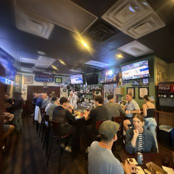 The First Seat - Bar and seating area - Sports Bars Near Me - Bentonville, Arkansas The First Seat - Bar and seating area - Sports Bars Near Me - Bentonville, Arkansas