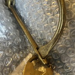 Baggott Church Street - Naval locking clip for a personal kit bag.  Like person effects or shaving.  .  Stamped with a anchor on weather cover over key hole.
