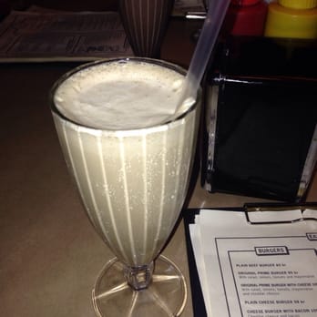 Prime Burger - My way-too-melted milkshake. Salty licorice is a nice novelty flavor for a milkshake, but that consistency was horrid. - Burgers Near Me - Stockholm, Alberta