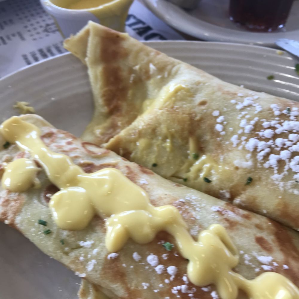 Stacked - These are the florentine crepes - love savory crepes and theirs are one of the best! This is only part of the order, I already ate one. - Breakfast & Brunch Near Me - Oak Lawn, Illinois Stacked - These are the florentine crepes - love savory crepes and theirs are one of the best! This is only part of the order, I already ate one. - Breakfast & Brunch Near Me - Oak Lawn, Illinois