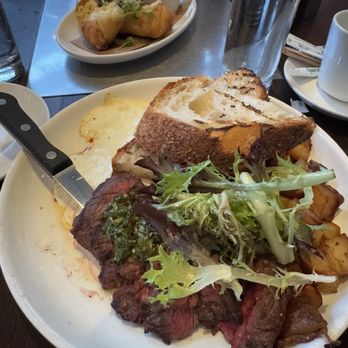 Cafeteria - Steak and Eggs. Mac and Cheese Eggrolls in background - New American Near Me - New York, New York Cafeteria - Steak and Eggs. Mac and Cheese Eggrolls in background - New American Near Me - New York, New York