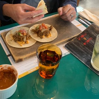 Guaca & Molé - Street tacos my friend ordered!! My camera didn't eat first! - Mexican Near Me - Dollard-des-Ormeaux, Quebec