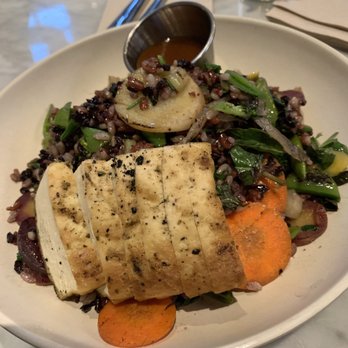 Flower Child - Forbidden rice with added on tofu. - Salad Near Me - Houston, Texas