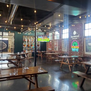 Veranda - the interior of a restaurant with tables and benches - Tapas/Small Plates Near Me - Calgary, Alberta