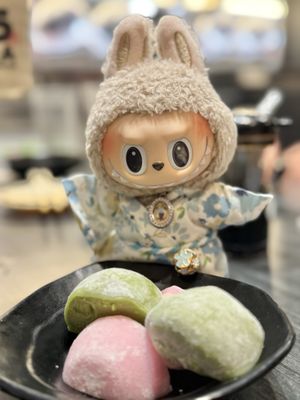 Kura Revolving Sushi Bar by null