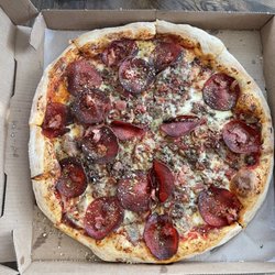 Bella Mia - Meatiest pizza on menu