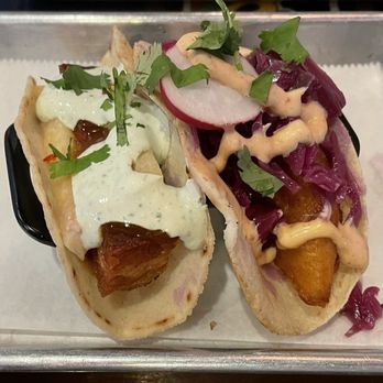 Lime & Salt Taco Bar - A pork-belly chicharron taco, a rockfish taco, with jicama slaw, avocado-cilantro crema, lightly-pickled cabbage, and chipotle aioli. - Tacos Near Me - Columbia, Maryland Lime & Salt Taco Bar - A pork-belly chicharron taco, a rockfish taco, with jicama slaw, avocado-cilantro crema, lightly-pickled cabbage, and chipotle aioli. - Tacos Near Me - Columbia, Maryland