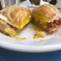 Breakfast Croissant.  The egg is perfect with all the goodness in between a yummy fresh croissant!