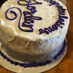 a birthday cake on a table a birthday cake on a table