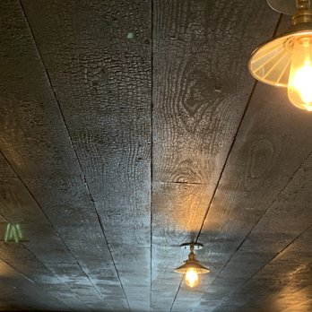 Cochecton Fire Station - The ceiling that have been burnt and charred to add to the aesthetics of the theme - Cocktail Bars Near Me - Cochecton, New York Cochecton Fire Station - The ceiling that have been burnt and charred to add to the aesthetics of the theme - Cocktail Bars Near Me - Cochecton, New York