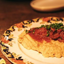 Shrimp and grits, stone ground grit served with creole sauce